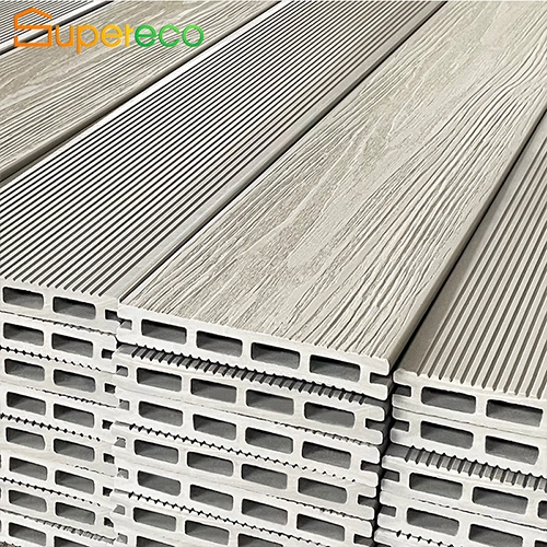 Key Characteristics Affordability: The most notable feature of traditional WPC deck flooring is its cost-effectiveness. It is an ideal choice for projects with tight budgets. Customization: Available in various specifications and colors, allowing for flexibility in design to match different aesthetic preferences. Wide Range of Use: Suitable for diverse outdoor applications, making it a versatile choice for many environments. Basic Durability: While it offers decent durability, it does not match the longevity and performance of second-generation and higher-end WPC products. Applications of Traditional WPC Deck Flooring 1. Residential Decking Applications: Traditional Wood Plastic Composite (WPC) Deck FlooringGarden Paths: Suitable for creating walkways and paths in gardens and backyards. Patio Flooring: An excellent choice for covering patio areas. Functions: Aesthetic Enhancement: Adds a visually appealing element to residential outdoor spaces. Easy Installation: Simple to install, making it a good choice for DIY projects. Comfort: Provides a smooth and splinter-free surface for walking barefoot. 2. Commercial Spaces Applications: Outdoor Seating Areas: Used in cafes, restaurants, and other commercial spaces to create inviting outdoor seating areas. Temporary Installations: Ideal for temporary setups at events, exhibitions, and trade shows. Functions: Cost-Effective: Helps businesses manage costs while providing a functional and attractive outdoor space. Customizable: Can be tailored to match the branding and aesthetic requirements of different commercial entities. Quick Setup: Facilitates rapid installation and removal, making it suitable for temporary or seasonal use