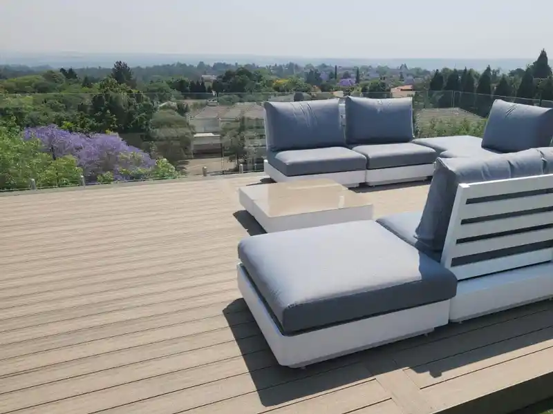 UV resistant capped composite decking installed in a sun-exposed outdoor area