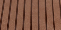 Medium stripe composite decking surface finish for outdoor applications