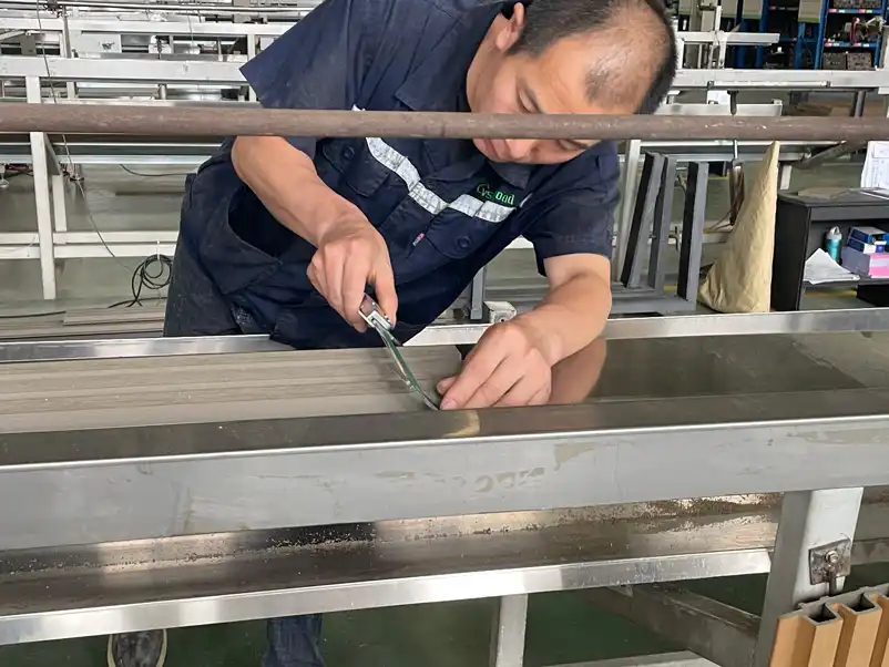 Quality testing during traditional composite decking manufacturing