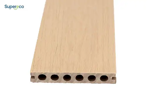 Round-hole capped composite decking profile with lightweight hollow structure
