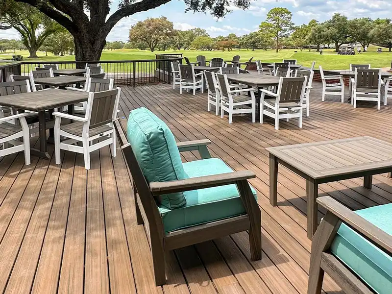 Wholesale composite decking flooring installed on a busy outdoor restaurant terrace.