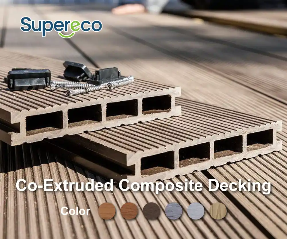 Capped co-extruded composite decking profiles with protective shield and grooved anti-slip surface